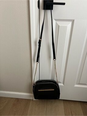 Black Crossbody Bag with Gold Chain Accent